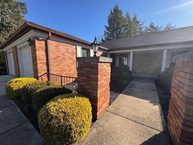 view of property exterior featuring a garage