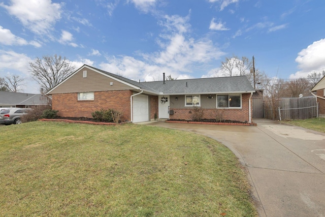 single story home featuring a garage and a front yard