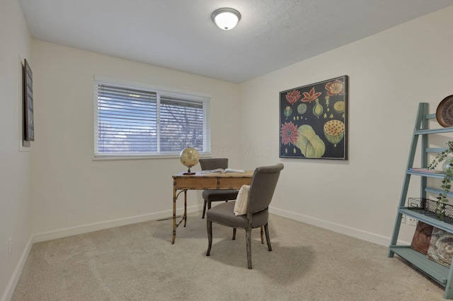 view of carpeted office space