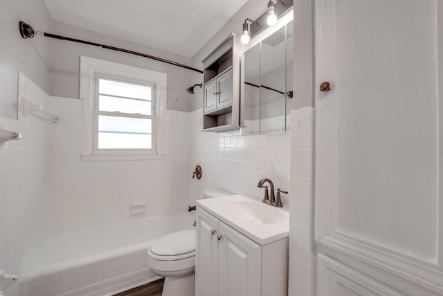 full bathroom with tiled shower / bath combo, backsplash, toilet, vanity, and tile walls