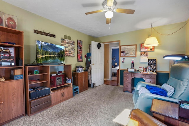 interior space with ceiling fan and light carpet