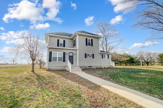 view of front property featuring a front lawn