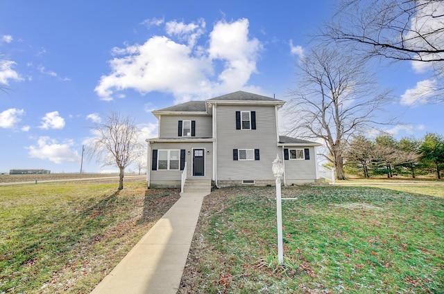 view of front of property with a front yard