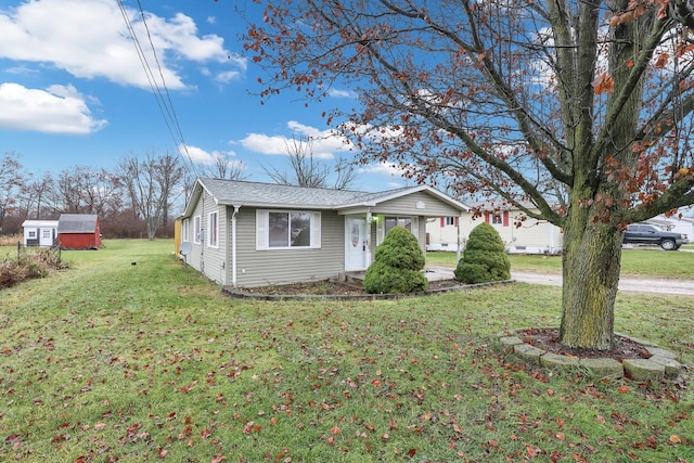 view of front of home with a front yard