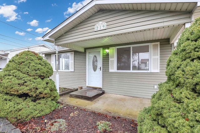 entrance to property with a patio area