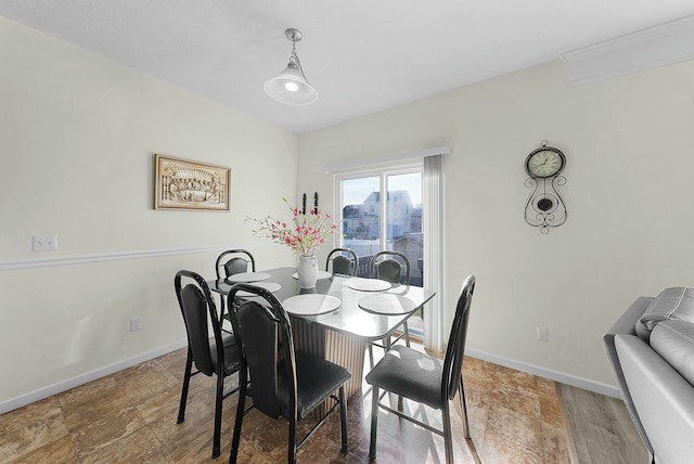 dining space featuring hardwood / wood-style flooring