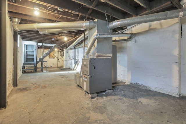 basement featuring heating unit