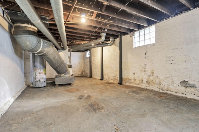 basement featuring water heater