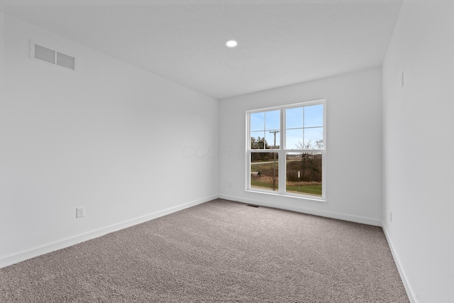 view of carpeted spare room