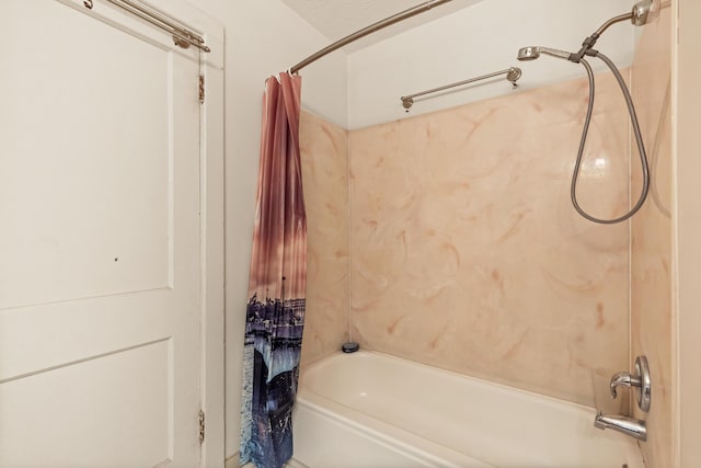 bathroom featuring shower / tub combo