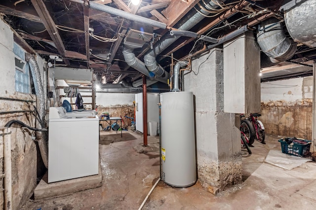 basement with washer and dryer and water heater