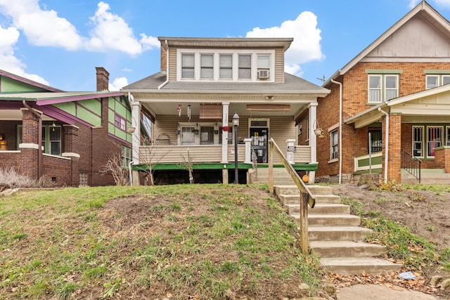 view of front of property featuring covered porch