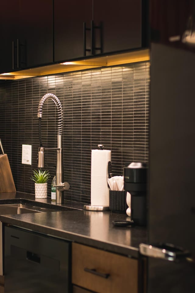 interior space with dishwasher and sink