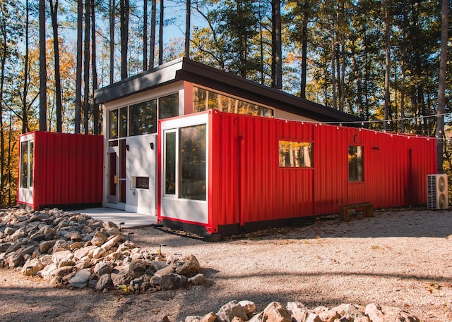 exterior space featuring ac unit