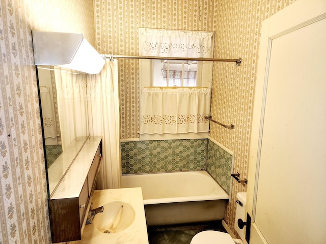 bathroom with vanity and a tub to relax in