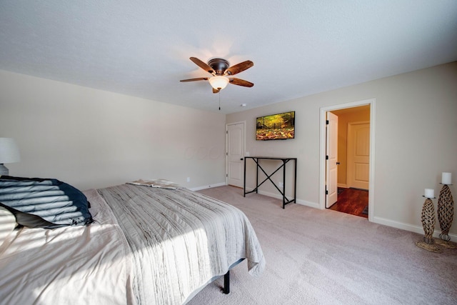 bedroom featuring ceiling fan and carpet flooring