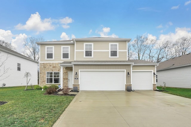 view of property featuring a garage and a front yard