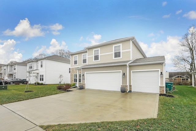 front of property featuring a garage and a front lawn