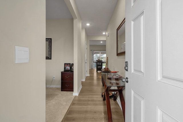 hall with light wood-type flooring