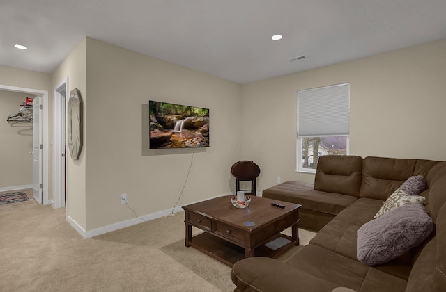 living room with light colored carpet