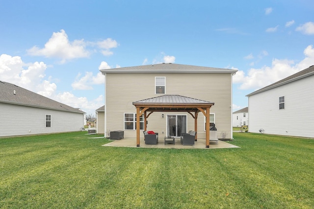 back of property featuring a gazebo, a patio, central AC, and a lawn