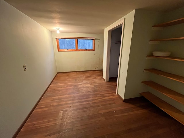 interior space with dark hardwood / wood-style flooring