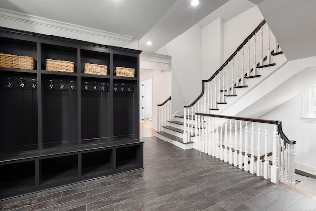 mudroom featuring crown molding