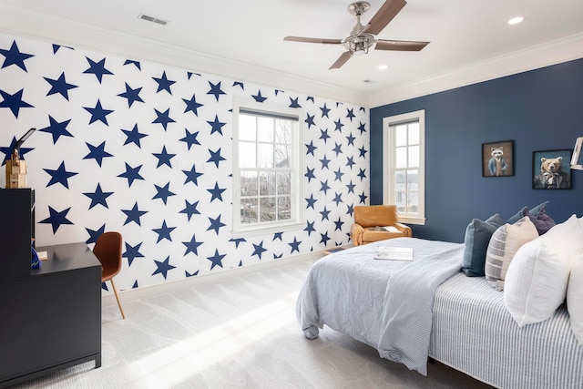 bedroom featuring ornamental molding, carpet floors, and ceiling fan