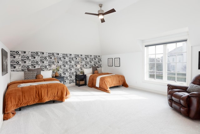 bedroom with carpet floors, ceiling fan, and vaulted ceiling