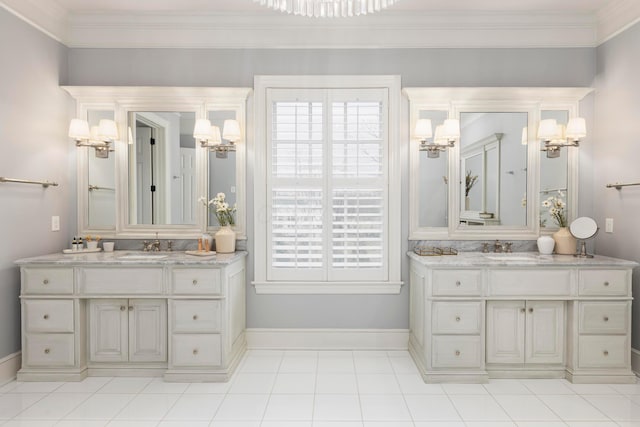 bathroom featuring vanity, crown molding, and a healthy amount of sunlight