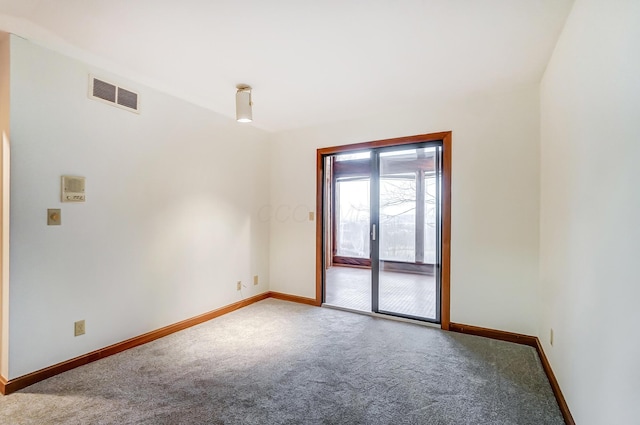 unfurnished room with carpet