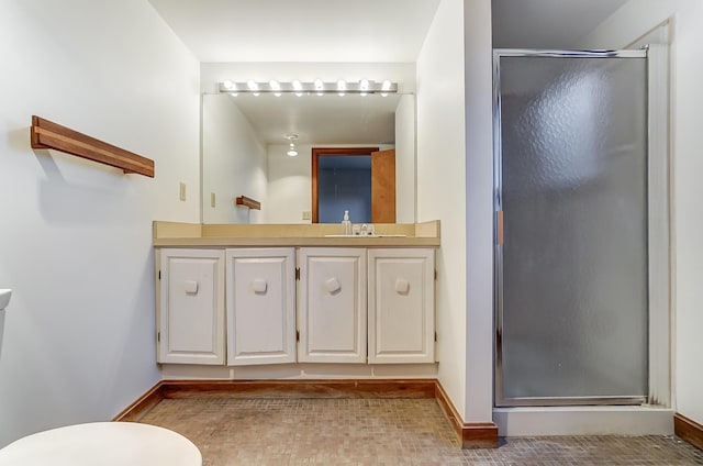 bathroom featuring vanity and walk in shower