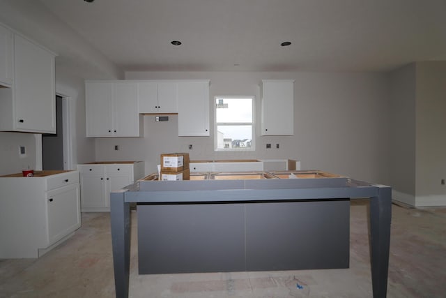 kitchen with white cabinets and a kitchen island