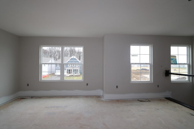 spare room featuring a healthy amount of sunlight