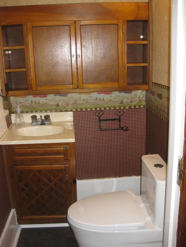 bathroom with vanity and toilet