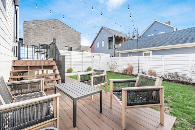 wooden terrace with outdoor lounge area