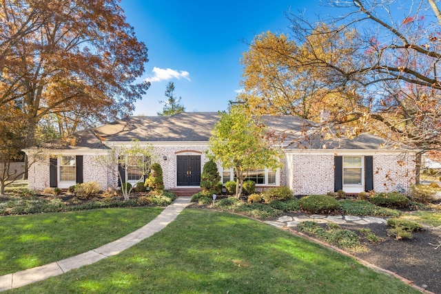 ranch-style house with a front yard