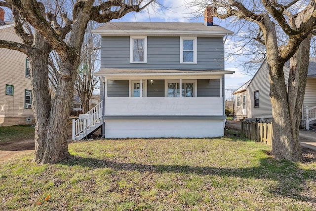 front facade with a front lawn