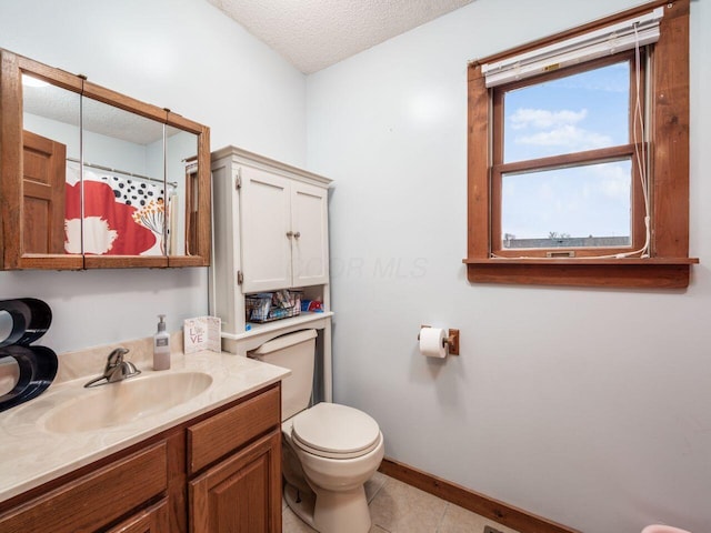 bathroom featuring vanity, tile patterned floors, toilet, a textured ceiling, and curtained shower