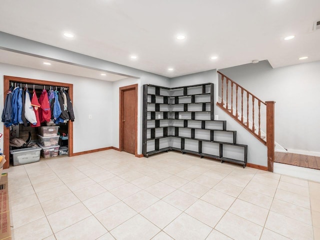 interior space featuring light tile patterned floors