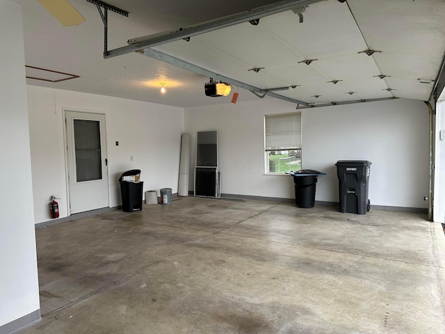 garage featuring a garage door opener