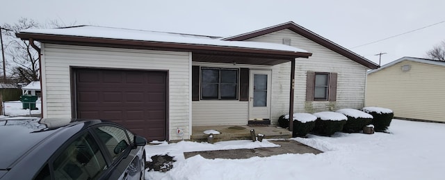 view of front of property featuring a garage