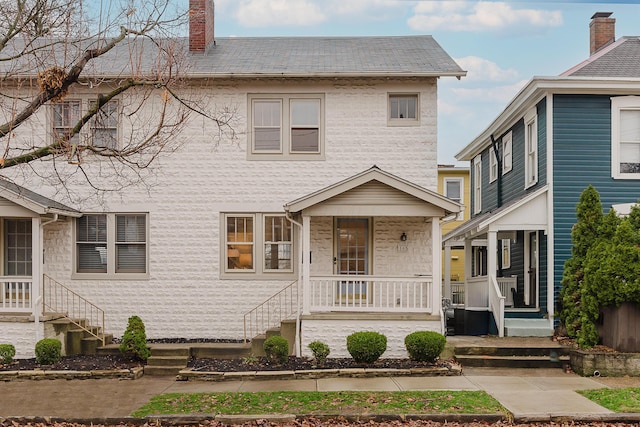 view of front of home featuring covered porch