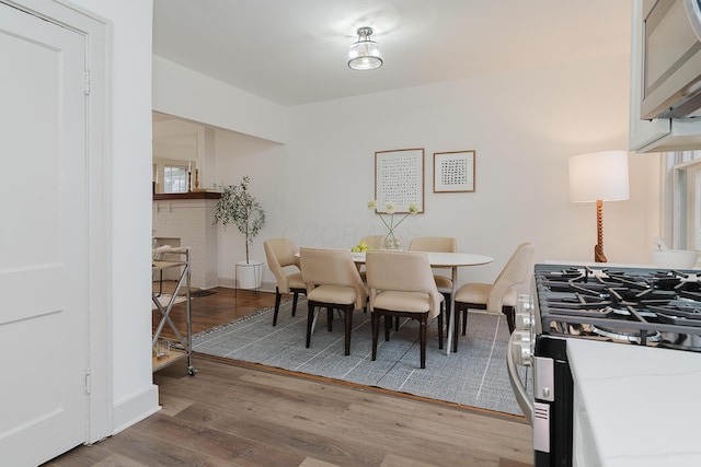 dining space featuring light hardwood / wood-style floors