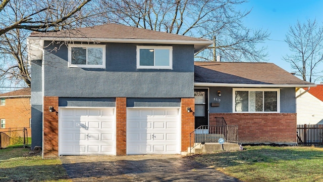 tri-level home featuring a garage