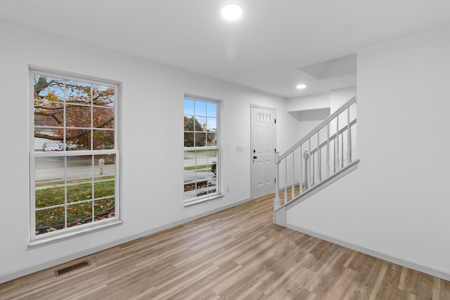 entryway with light hardwood / wood-style floors