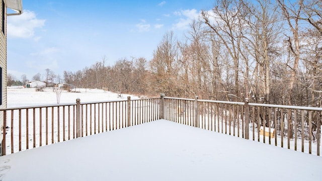 view of snow covered deck