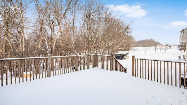 view of snow covered deck