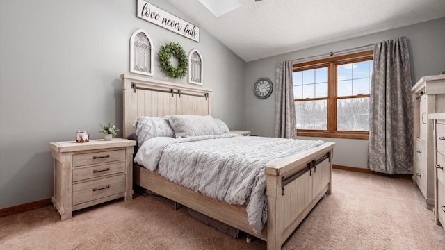 carpeted bedroom featuring vaulted ceiling