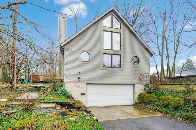 view of property exterior with a garage